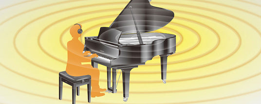 Illustration of a silhouette of a person wearing headphones playing a grand piano with abstract yellow sound waves in the background.