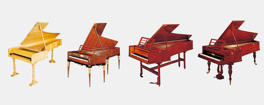 Four different styles of harpsichords on a white background.