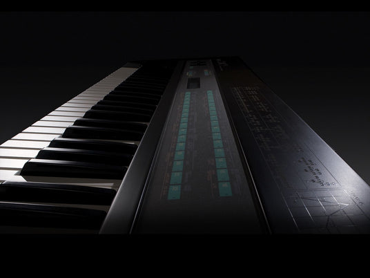 Close-up view of an electronic keyboard with illuminated LED panel displaying settings and functions, highlighting modern piano technology.