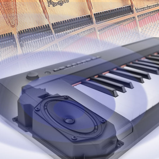 Close-up of a digital piano's keys with a transparent view showing the speaker system and internal structure, illustrating modern piano manufacturing technology.