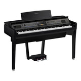 A Clavinova digital piano in a black finish, with a full keyboard and integrated pedals, designed for both practice and performance.