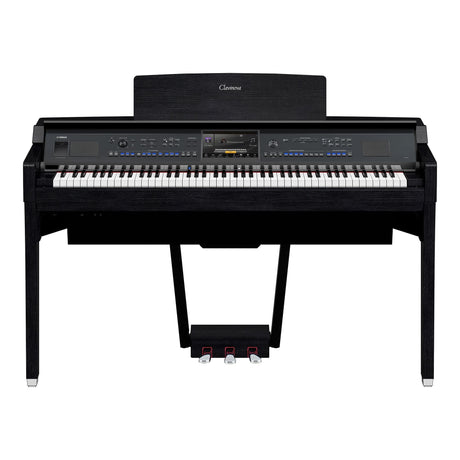 Black Clavinova digital piano with weighted keys, multiple sound controls, and integrated pedal unit.